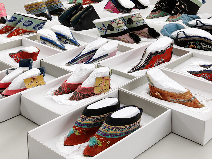 Twenty-eight pairs of shoes for bound feet and: looted goods?